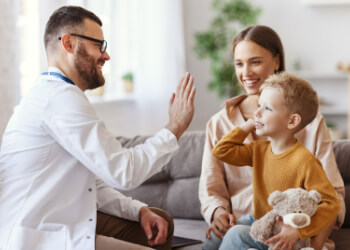 physician with school child